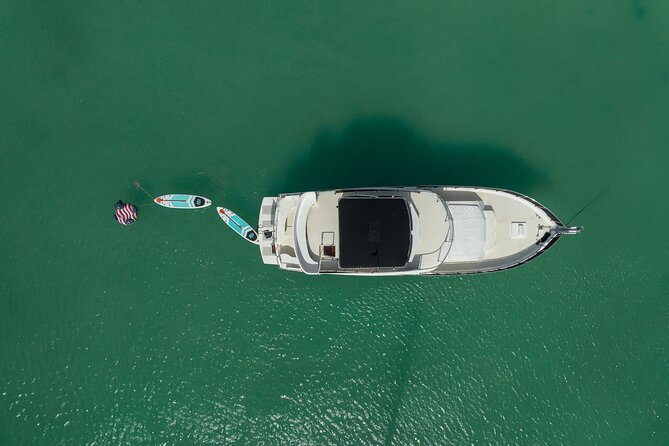 4 Hours - 53' Hatteras - Tulum, Playa Del Carmen, Riviera Maya - Fire-grilled chicken and a full standard bar