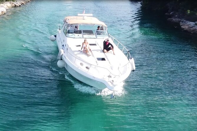 4 hours - Private 48ft Yacht all inclusive in Tulum and Playa del Carmen - Leaving Puerto Aventuras on a private yacht