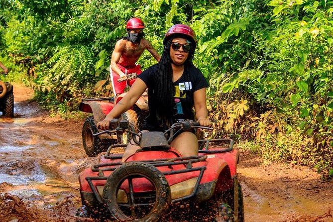 ATV Tour with Cenote swim, Ziplines, Transportation and Lunch Included - ATV riding through the jungle course