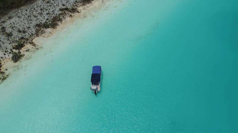 Bacalar: 3-hr Pontoon Boat Tour with Beach Club + Kayaks - Cenote Negro, Also Called the Witch’s Cenote