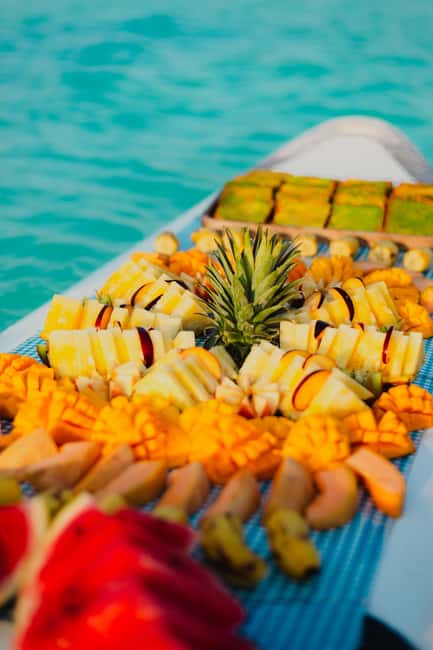 Bacalar Lagoon Sailing Tour with Open Bar and Mexican Lunch - Swimming time in clear turquoise water