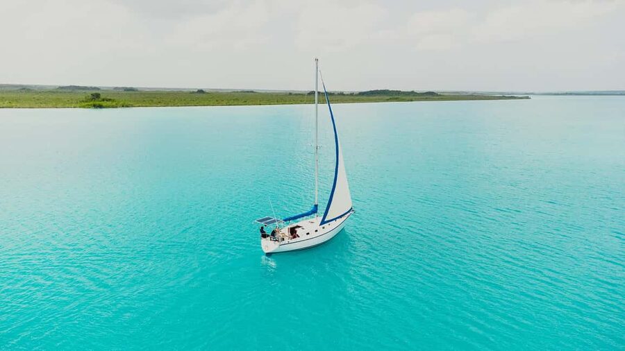 Bacalar Lagoon Sailing Tour with Open Bar and Mexican Lunch - Crew service, music, and group atmosphere