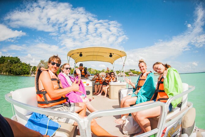 BACALAR Seven Color Lagoon Boat Excursion from Costa Maya - Swimming in clear freshwater