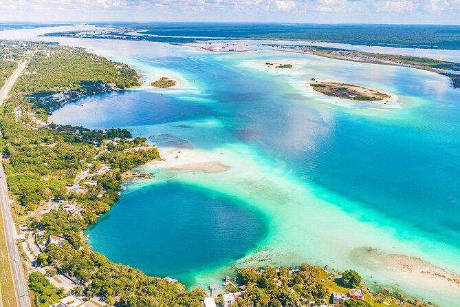 BACALAR Seven Color Lagoon Boat Excursion from Costa Maya - The pontoon ride across the Seven Color Lagoon