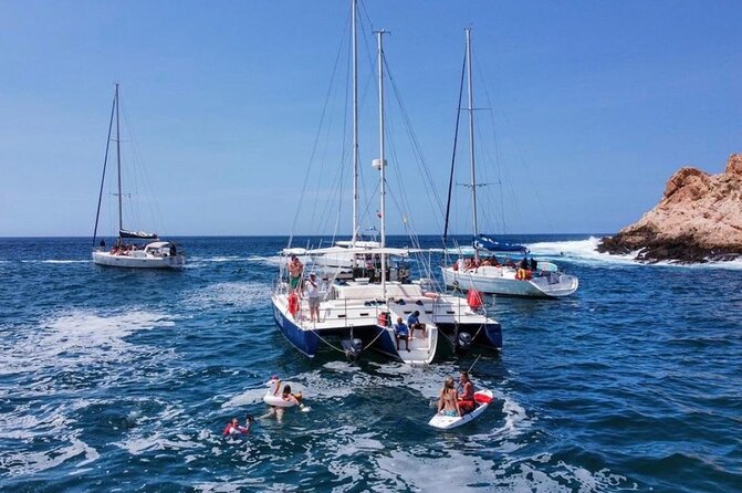 Cabo San Lucas and Santa Maria Bay Snorkeling Sightseeing Cruise - Lunch, drinks, and the onboard mood