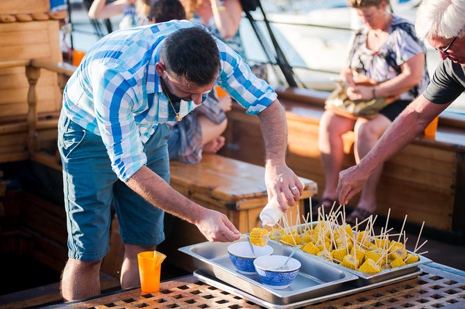 Cabo San Lucas Shopping, Tequila Tasting, and Snorkel Tour - Boarding the catamaran near Land’s End