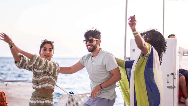 Cabo San Lucas: Sunset Party Cruise with Open Bar - Open bar, snacks, and music on board