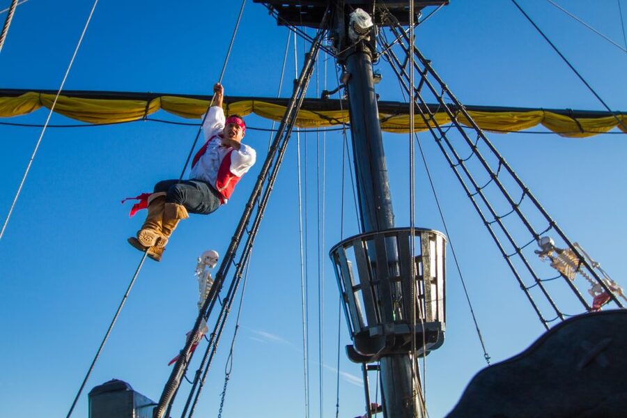 Cabo San Lucas: Sunset Pirate Ship Cruise with Dinner Show - A pirate ship with a very Cabo backdrop