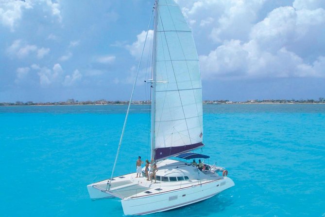 Cancun Half-Day Sailing Catamaran Cruise to Isla Mujeres - Sailing across Cancun’s turquoise water