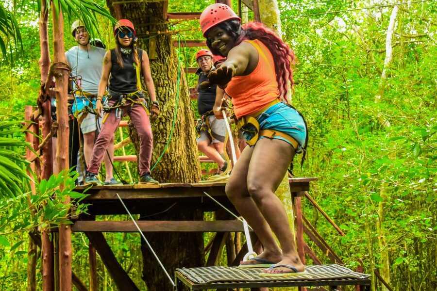 Cancun: Jungle ATV Tour, Ziplining, and Cenote Swim - Three ziplines above the trees