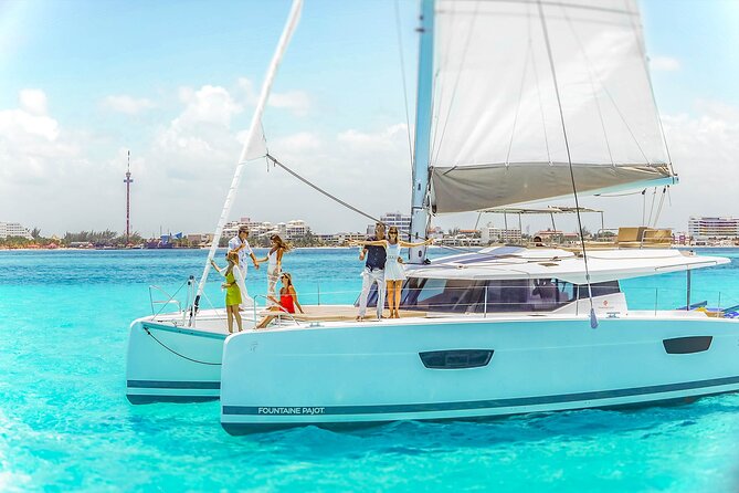 Catamaran to Isla Mujeres Snorkeling Tour with Open Bar and Lunch - The snorkeling stop: beautiful water, limited time