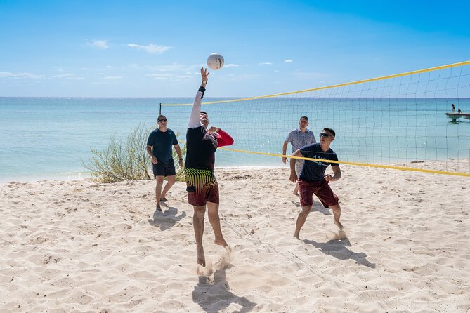 Cozumel: KUZÁ Beach Pass with Buffet, Open Bar & Activities - Check-in, loungers, and the day’s rhythm