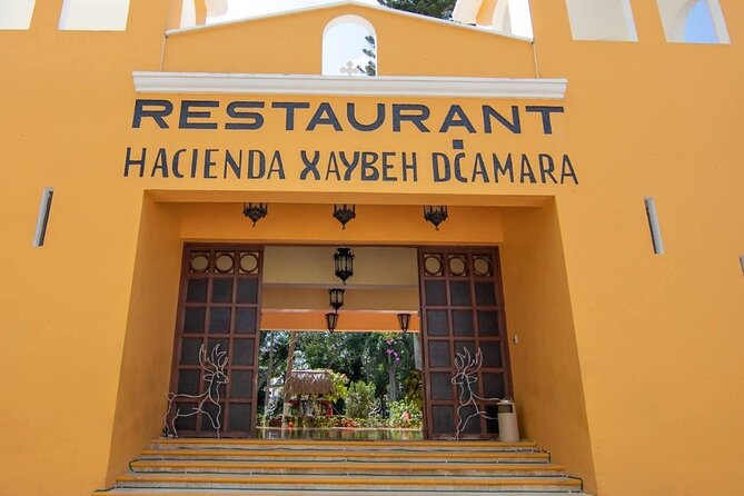 From Merida: Chichen Itza Tour, Izamal, Cenote Ik Kil and Food - Izamal: yellow streets and three layers of Yucatán