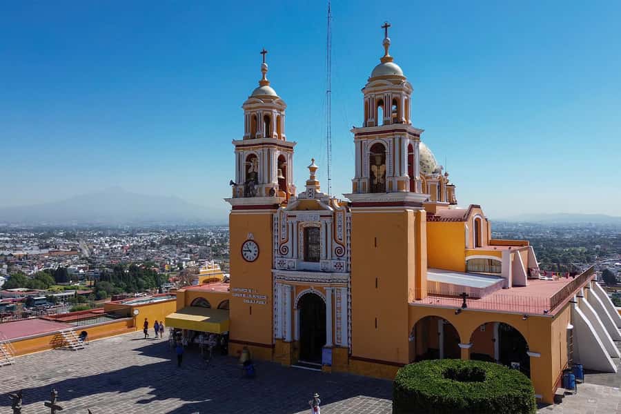 From Mexico City: Puebla, Cholula and Tonantzintla Day Trip - Guides, groups, and the value of $89