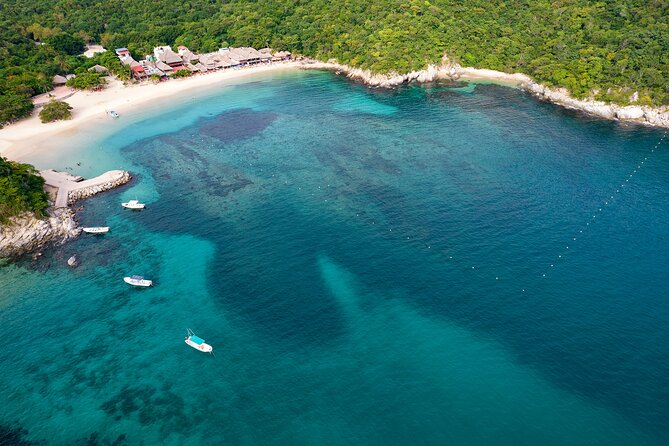 Full Day Tour of the Bays of Huatulco - Boat comfort, drinks, and language