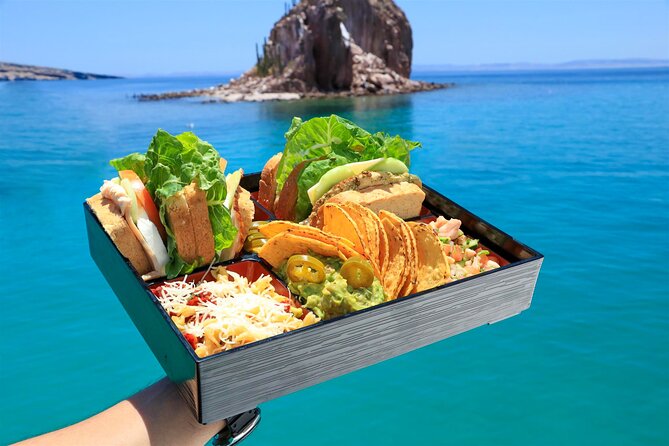 Half Day Cabo Snorkel Adventure with Lunch and Open Bar - Fruit, Sandwiches, Guacamole, and the Open Bar