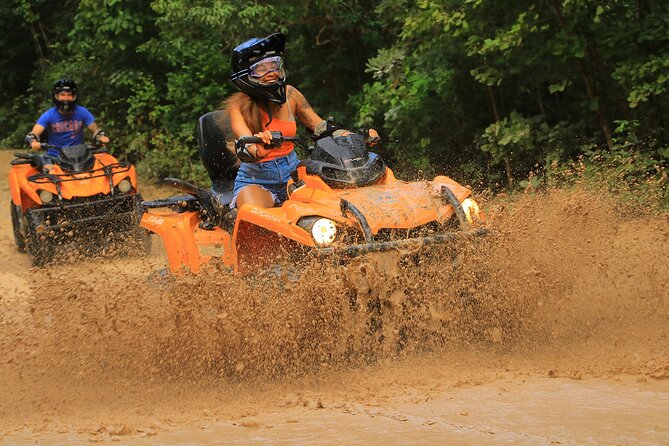 Hidden Cenote Swim & ATV Jungle Adventure with Transportation - Riding the Can-Am Outlander through the trees