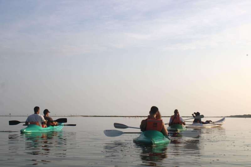 Holbox: Guided Sunrise/Sunset Kayak Tour by Mangrove Reserve - Entering the reserve by kayak