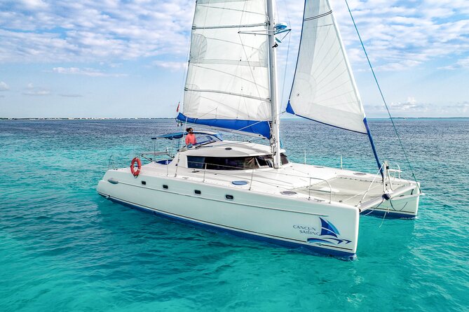 Isla Mujeres Catamaran Tour with Open Bar, Lunch and Snorkeling - The catamaran ride across the Caribbean