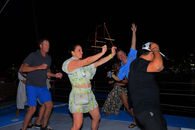 Los Cabos Catamaran Cruise with Open Bar & Light Snack - Open bar, music, and the onboard mood