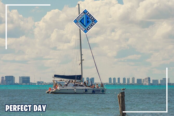 Luxury Catamaran tour to isla mujeres with transportation from Tulum - Drinks, music, and the optional spinnaker