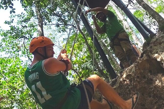 Maya Adrenaline Tulum: Cenote + 5 Ziplining + ATV Adventure - Entering the underground cenote