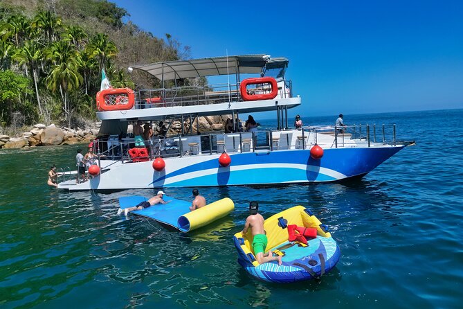 Mega Catamarans ALL INCLUSIVE Remote Paradise Beach Adventure - Lunch, Music, and the Ride Home