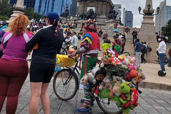 Mexico City E-Bike Tour with a taco and churros stop - Monumento de la Revolución and the city’s public spaces