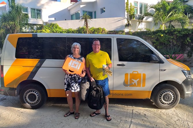 Private Transfer from Cancun Airport to Playa del Carmen - Finding the orange suitcase sign outside the terminal
