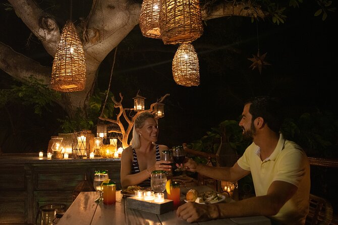 Rhythms of the night, Sunset Cruise, Candlelit Dinner & Alma Show - The torchlit arrival at Las Caletas