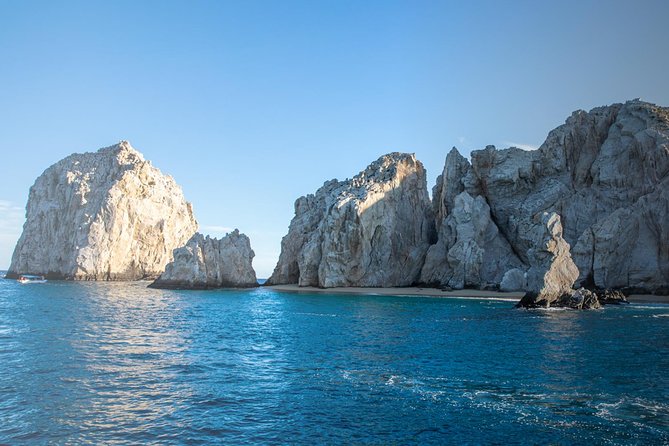 Snorkel & Explore Pelican Rock by Glass Boat + Photos - El Arco and Land’s End from the water