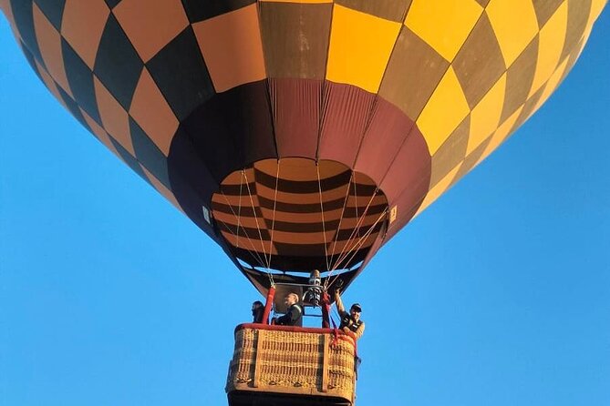 Sunrise Balloon Flight over Teotihuacan and Breakfast in Cueva - Price, included features, and the extra fee