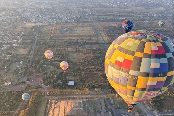 Sunrise Balloon Flight over Teotihuacan and Breakfast in Cueva - Tasting ancestral drinks and watching craftspeople work