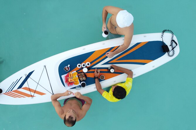Sunrise on Paddleboard with breakfast in the lagoon of 7 colors - The Black Cenote and Bacalar’s natural contrasts