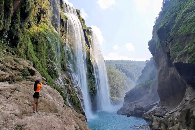 Tamul waterfall and water cave on a wooden canoe - Swimming at Cueva del Agua