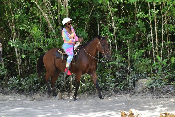 Tequila Tasting, Horseback Riding,ATV, Ziplines Cenote and Lunch - ATV riding on a dusty, rocky circuit