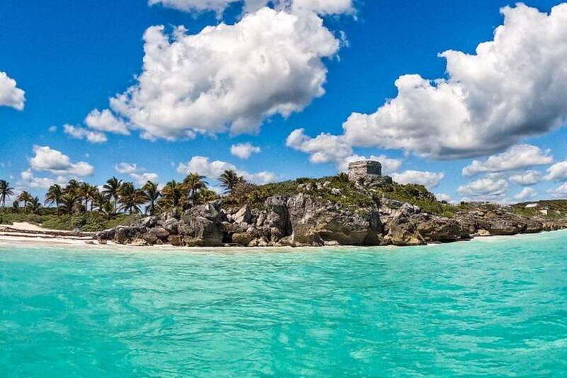 Tulum: 2-Hour Snorkeling in Two Spots of Tulum's Reef - The boat ride beneath Tulum’s coastal ruins