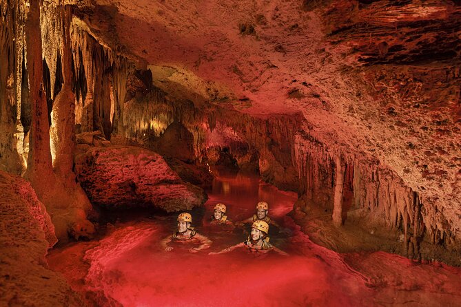Xplor Fuego with Buffet Style Dinner and transportation - Cave rafting, river swimming, and the spelunking route